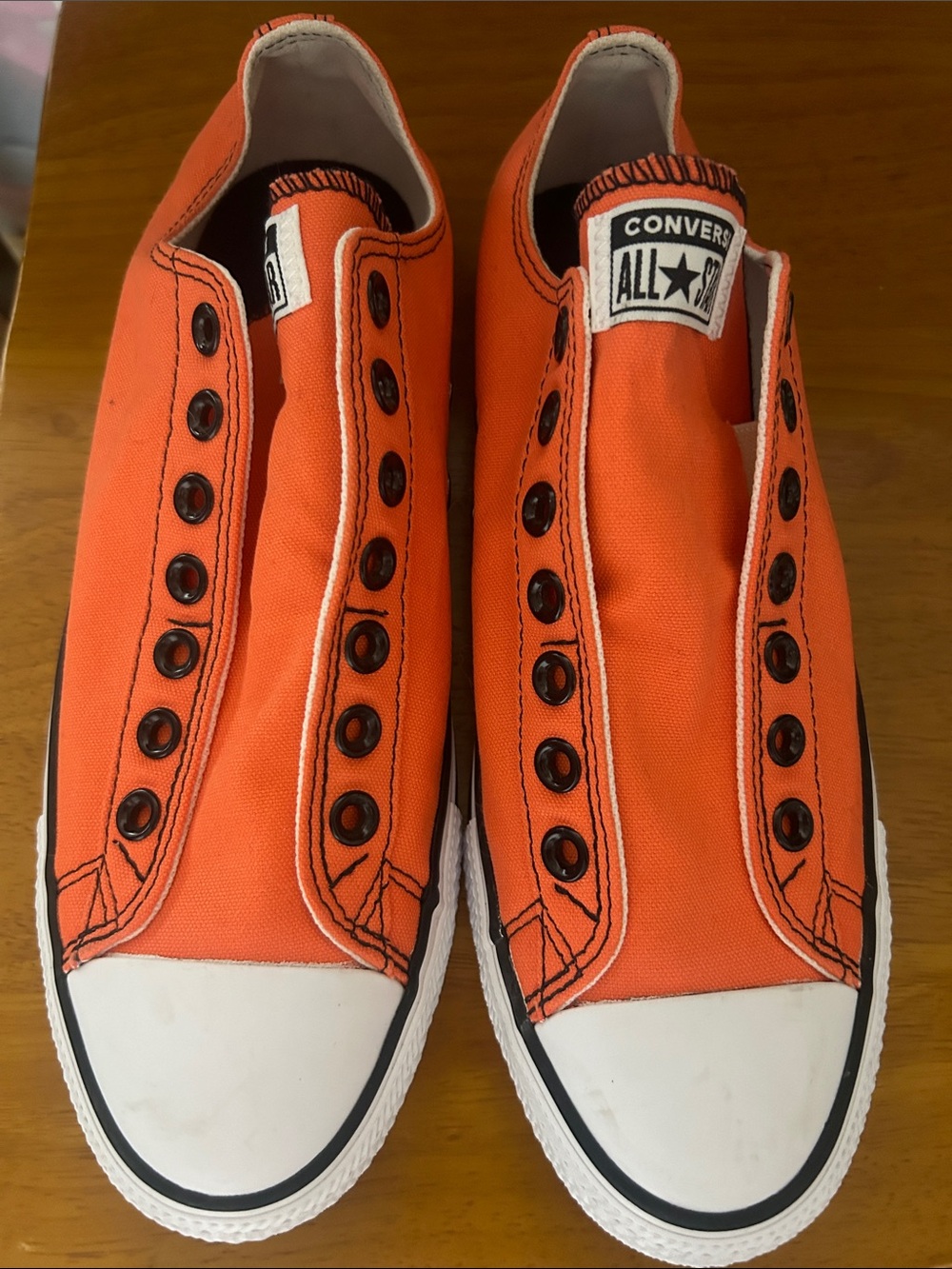 Converse Orange Slip-On Low Top men’s sneakers
